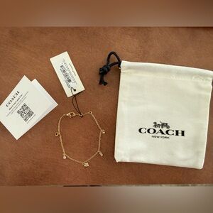 Coach Gold Charm Bracelet with Heart and Lock Charms